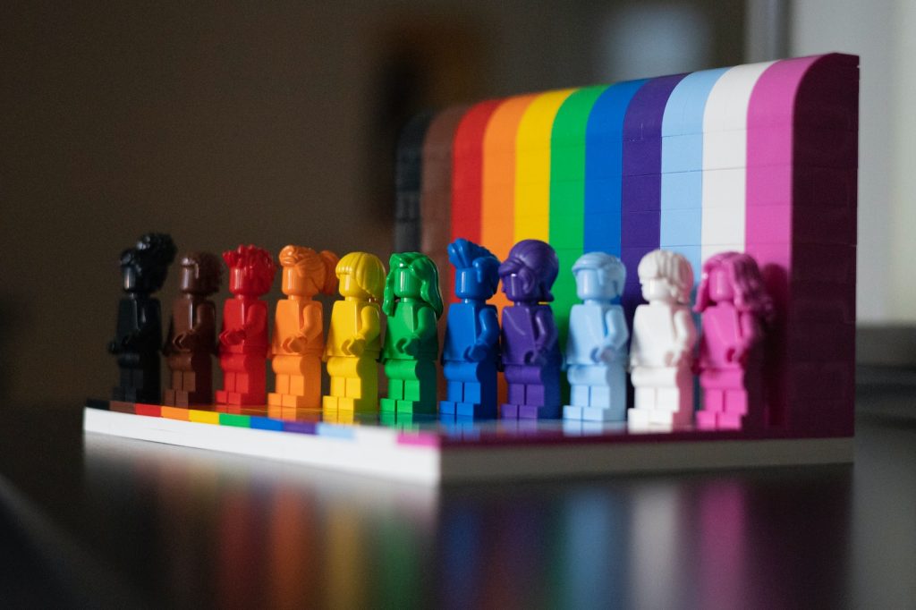 multi colored plastic blocks on white wooden table